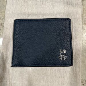New Psycho Bunny Wallet.  Never been used still in original pouch